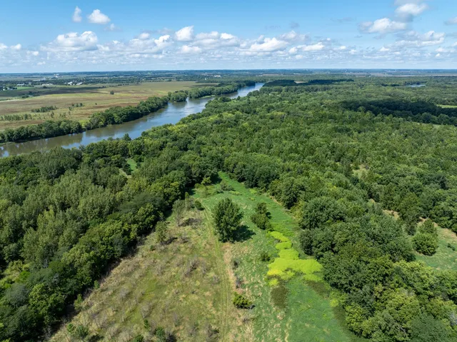 an aerial view of residential house with an outdoor space