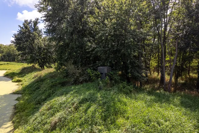 a view of a lake with a big yard