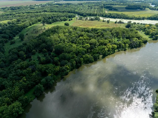 a view of a lake with a big yard