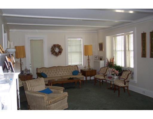 113 Morningside Road Worcester, MA 01602 - Photo 6 of 11 a living room with furniture and wooden floor