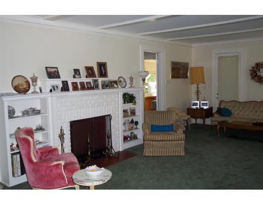113 Morningside Road Worcester, MA 01602 - Photo 7 of 11 a living room with furniture and a fireplace