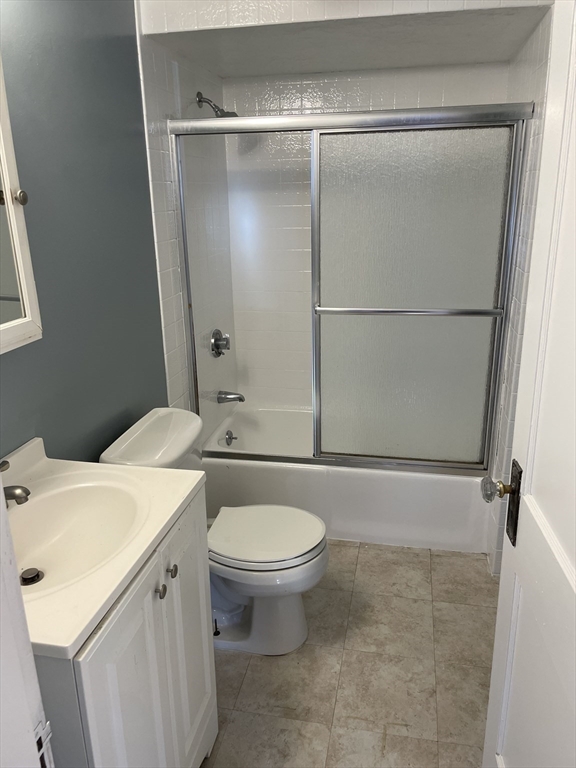 82 Brantwood Road, Unit 2 Worcester, MA 01602 - Photo 14 of 15 a bathroom with a sink toilet and shower