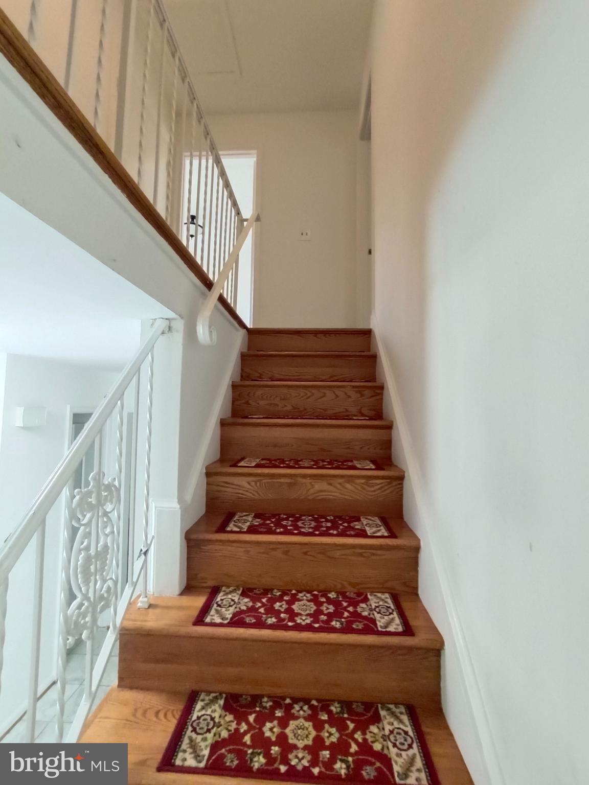 8835 Tuckerman Lane Potomac, MD 20854 - Photo 21 of 46 a view of entryway with wooden floor