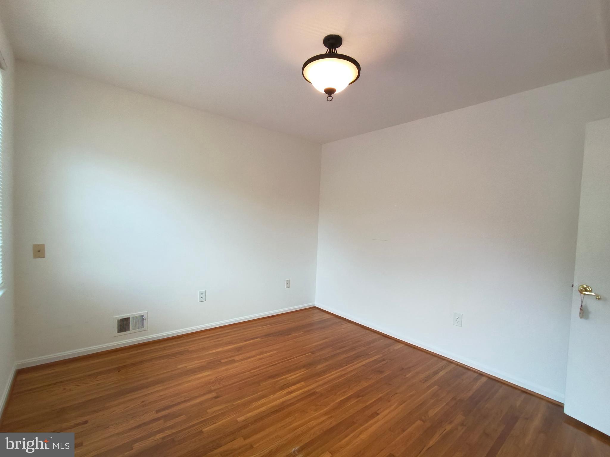 8835 Tuckerman Lane Potomac, MD 20854 - Photo 29 of 46 wooden floor in a room