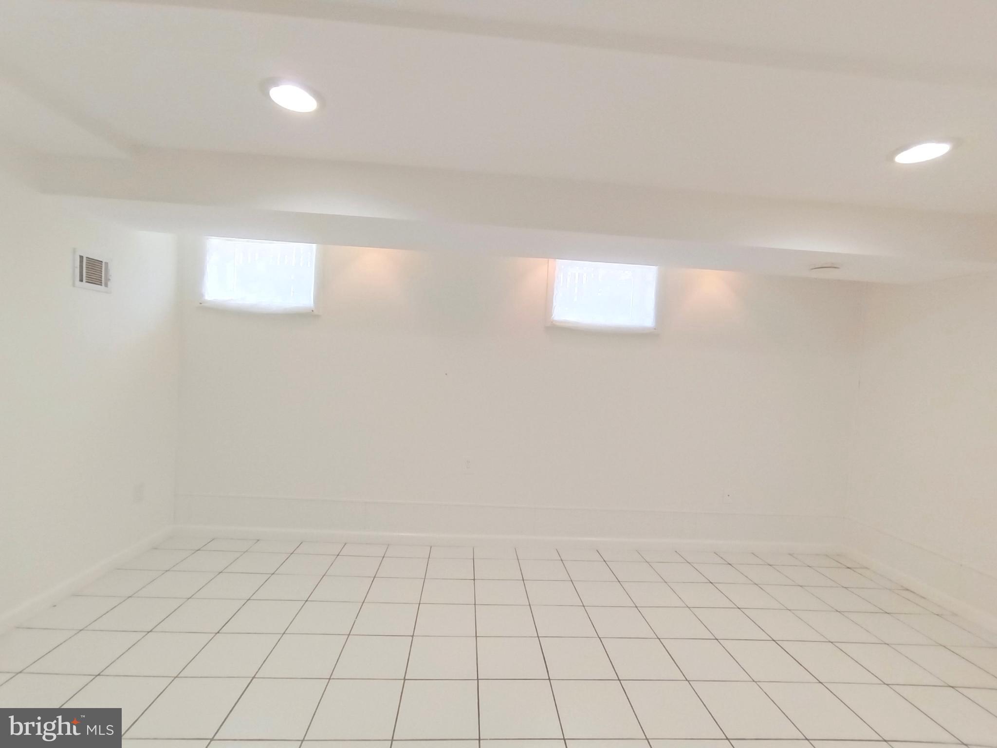 8835 Tuckerman Lane Potomac, MD 20854 - Photo 42 of 46 a view of an empty room