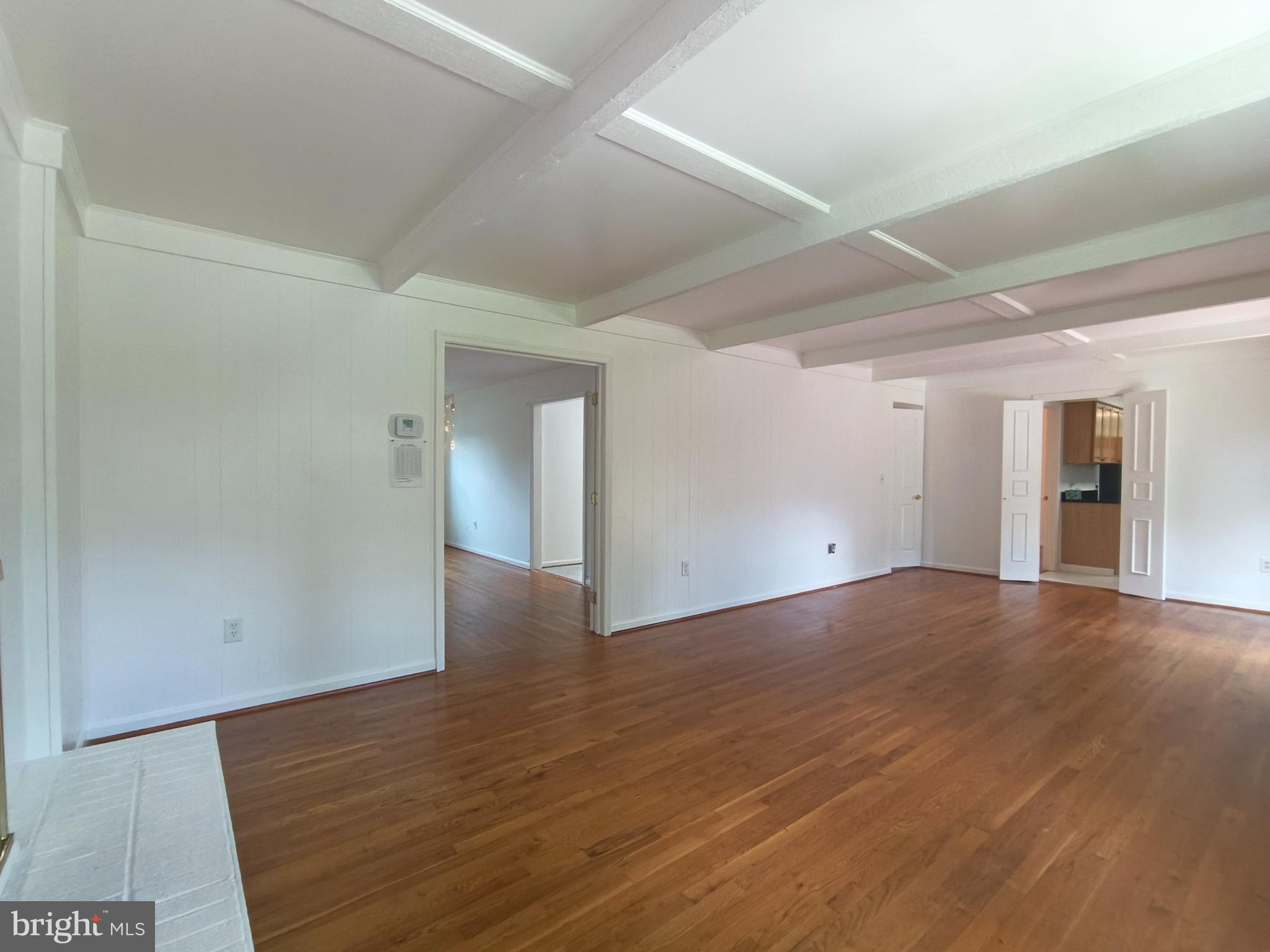 8835 Tuckerman Lane Potomac, MD 20854 - Photo 8 of 46 wooden floor in an empty room