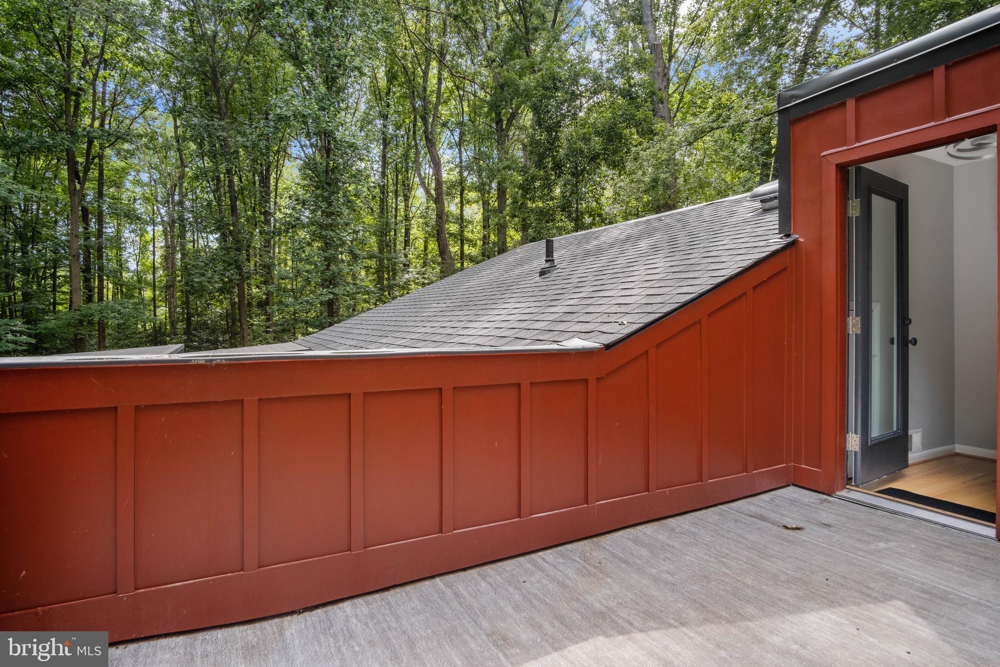 634 Springvale Road Great Falls, VA 22066 - Photo 19 of 67 a view of backyard with green space and wooden fence