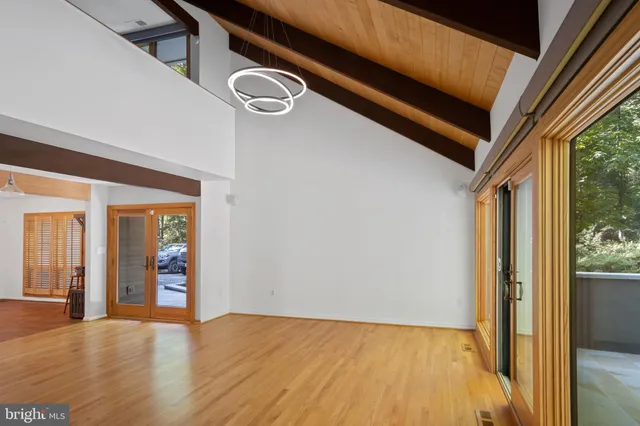 a large bathroom with a granite countertop sink a toilet and shower