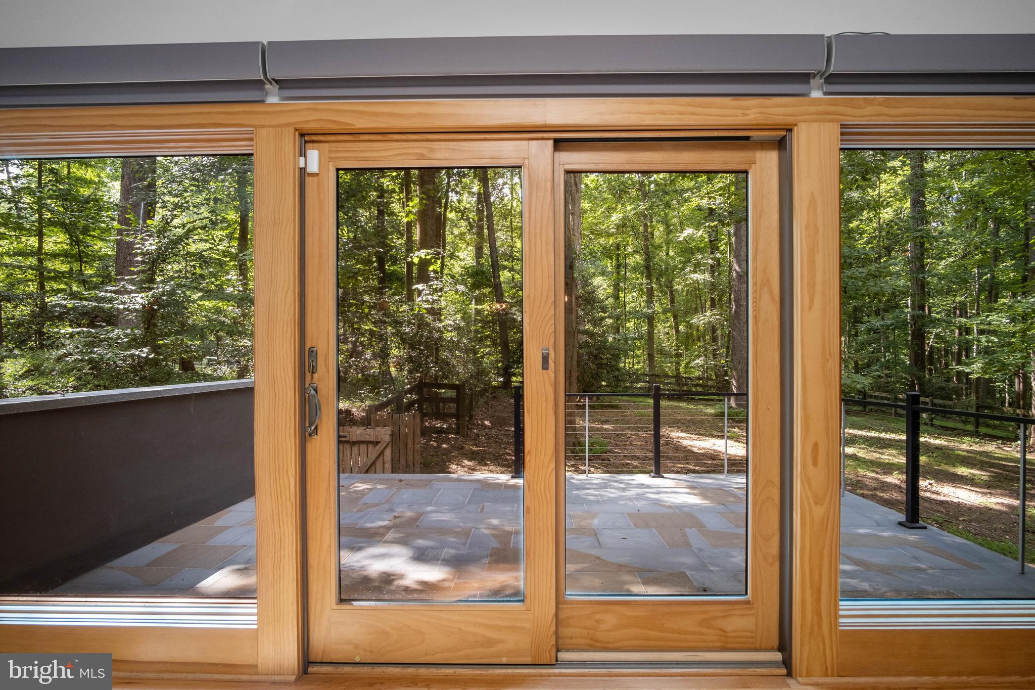 634 Springvale Road Great Falls, VA 22066 - Photo 34 of 67 a view of a room with a large window and wooden floor