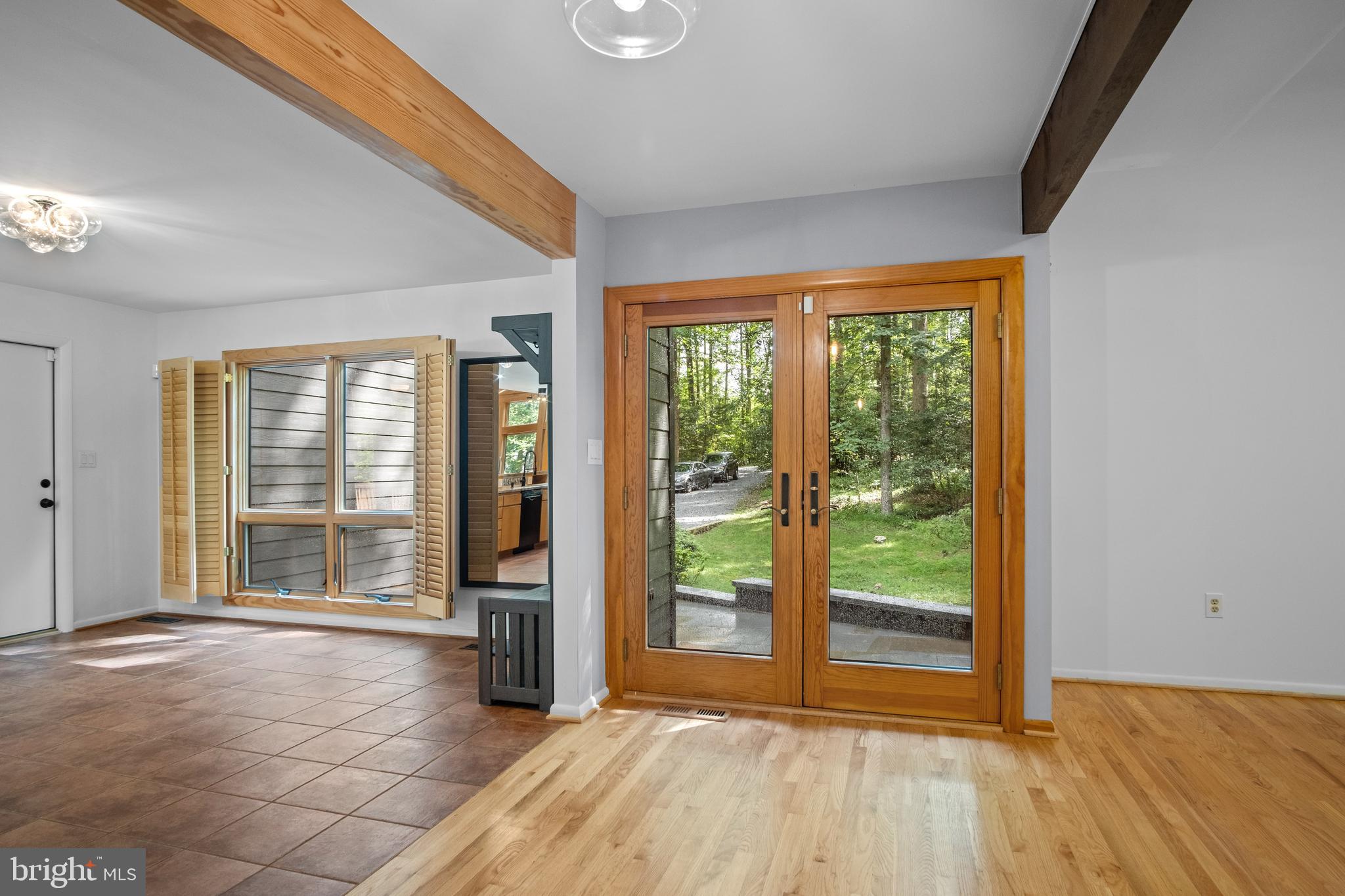 634 Springvale Road Great Falls, VA 22066 - Photo 36 of 67 a view of an empty room with wooden floor and a window