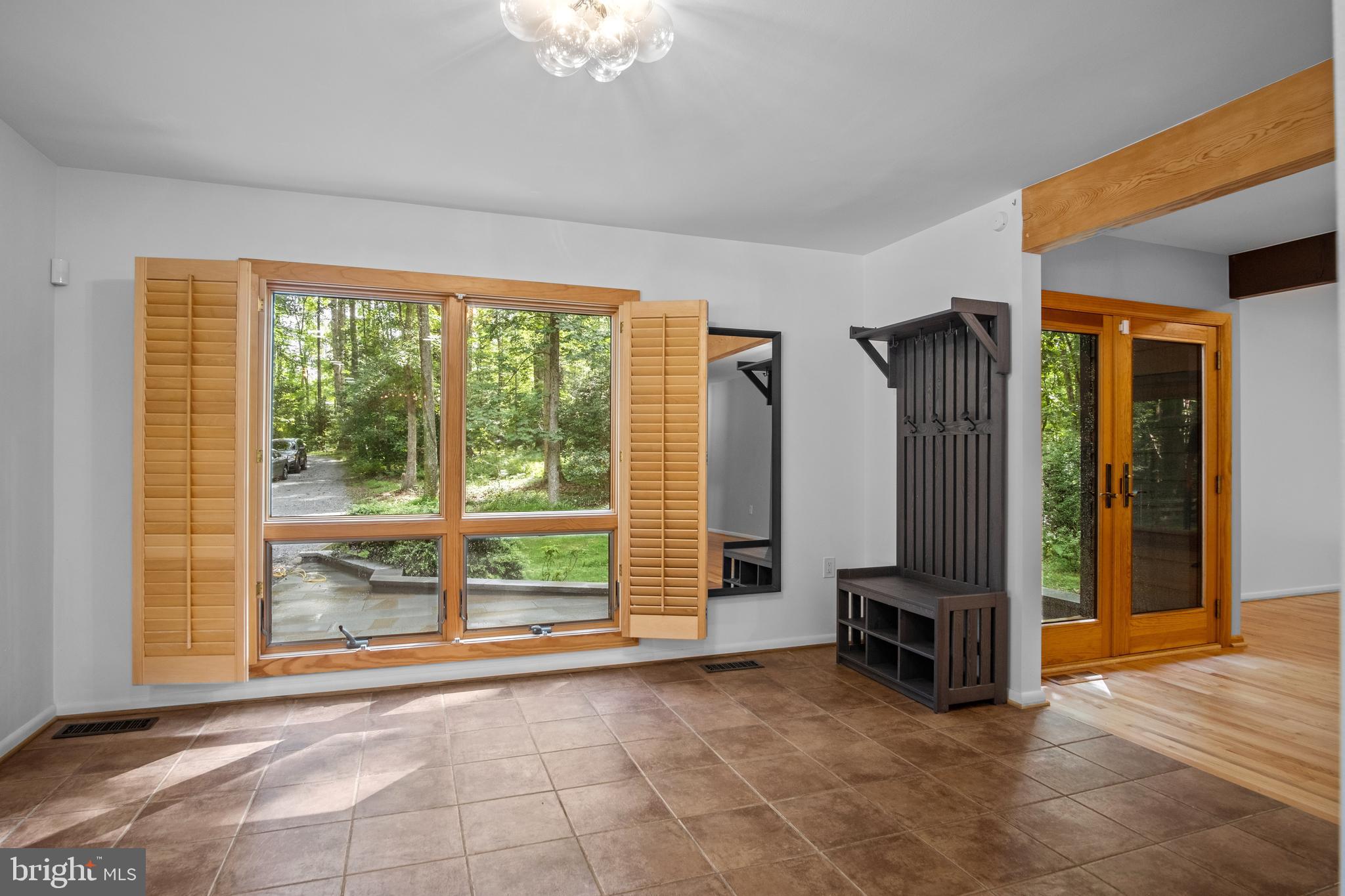 634 Springvale Road Great Falls, VA 22066 - Photo 37 of 67 a view of an empty room with a fireplace and a window