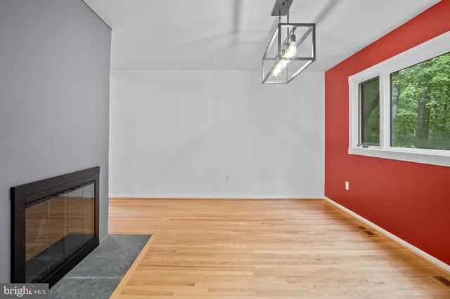 a view of a bedroom with washer and dryer