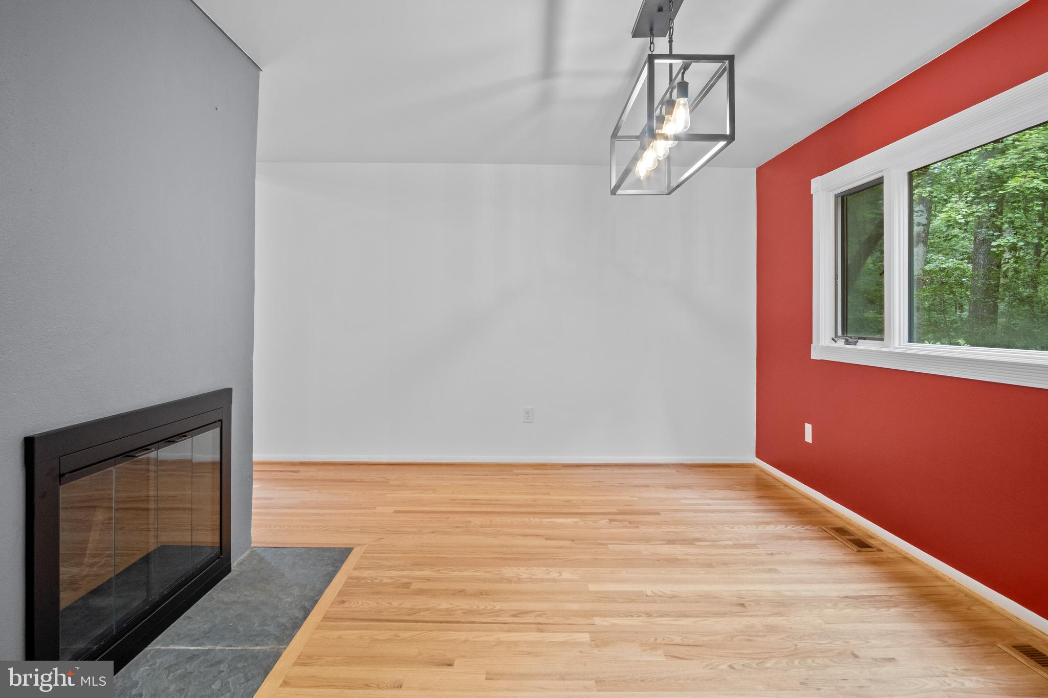 634 Springvale Road Great Falls, VA 22066 - Photo 38 of 67 a view of empty room with wooden floor and fan