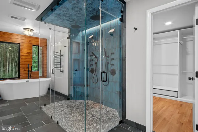 a living room with a fireplace and a flat screen tv