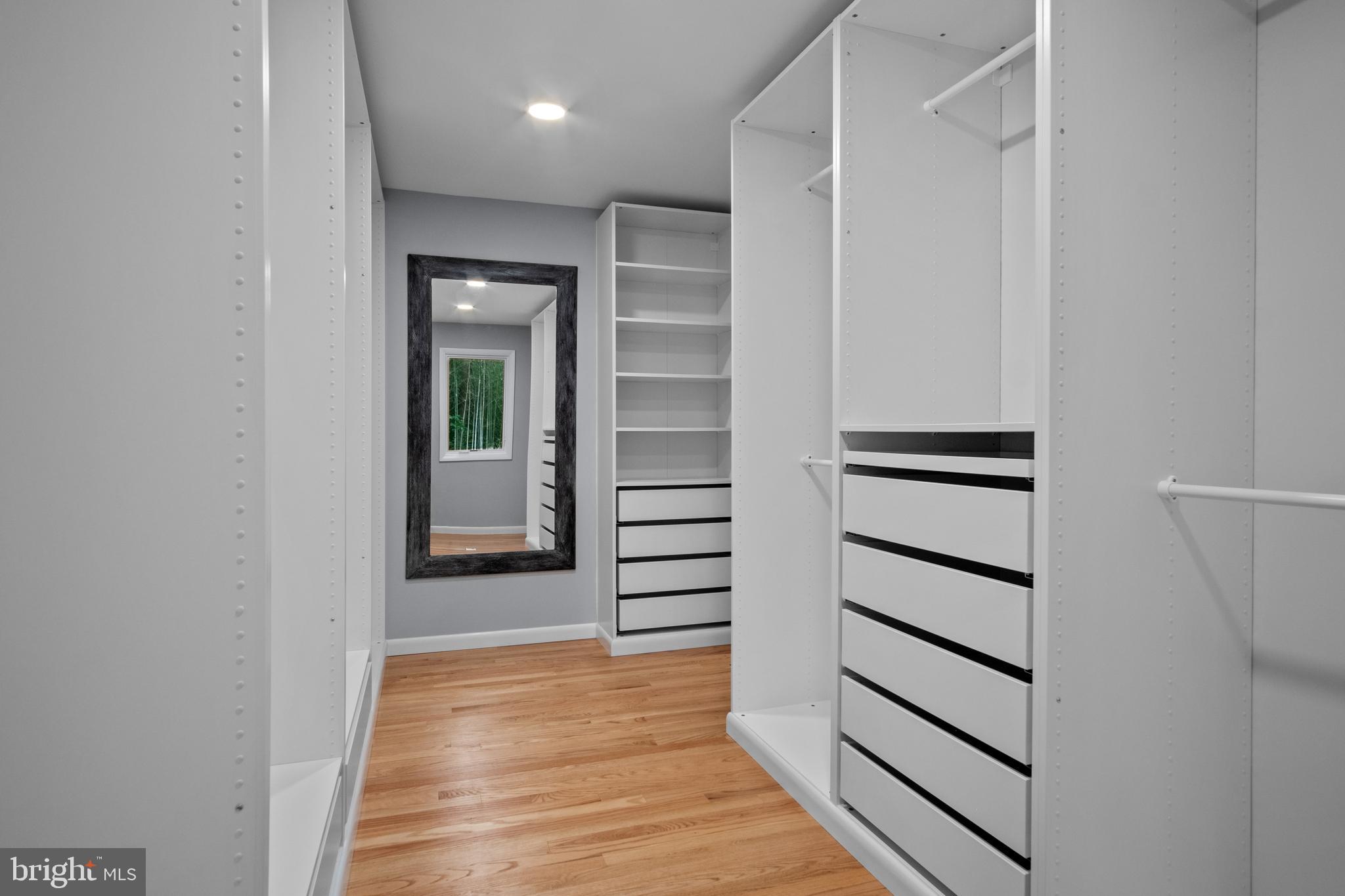 634 Springvale Road Great Falls, VA 22066 - Photo 48 of 67 a view of walk in closet with stairs