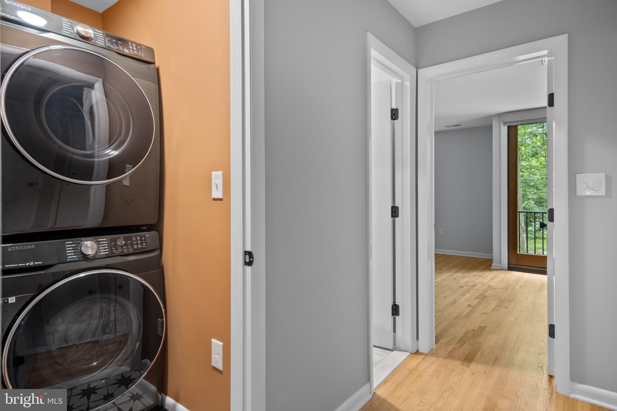 634 Springvale Road Great Falls, VA 22066 - Photo 54 of 67 a view of a bedroom with washer and dryer
