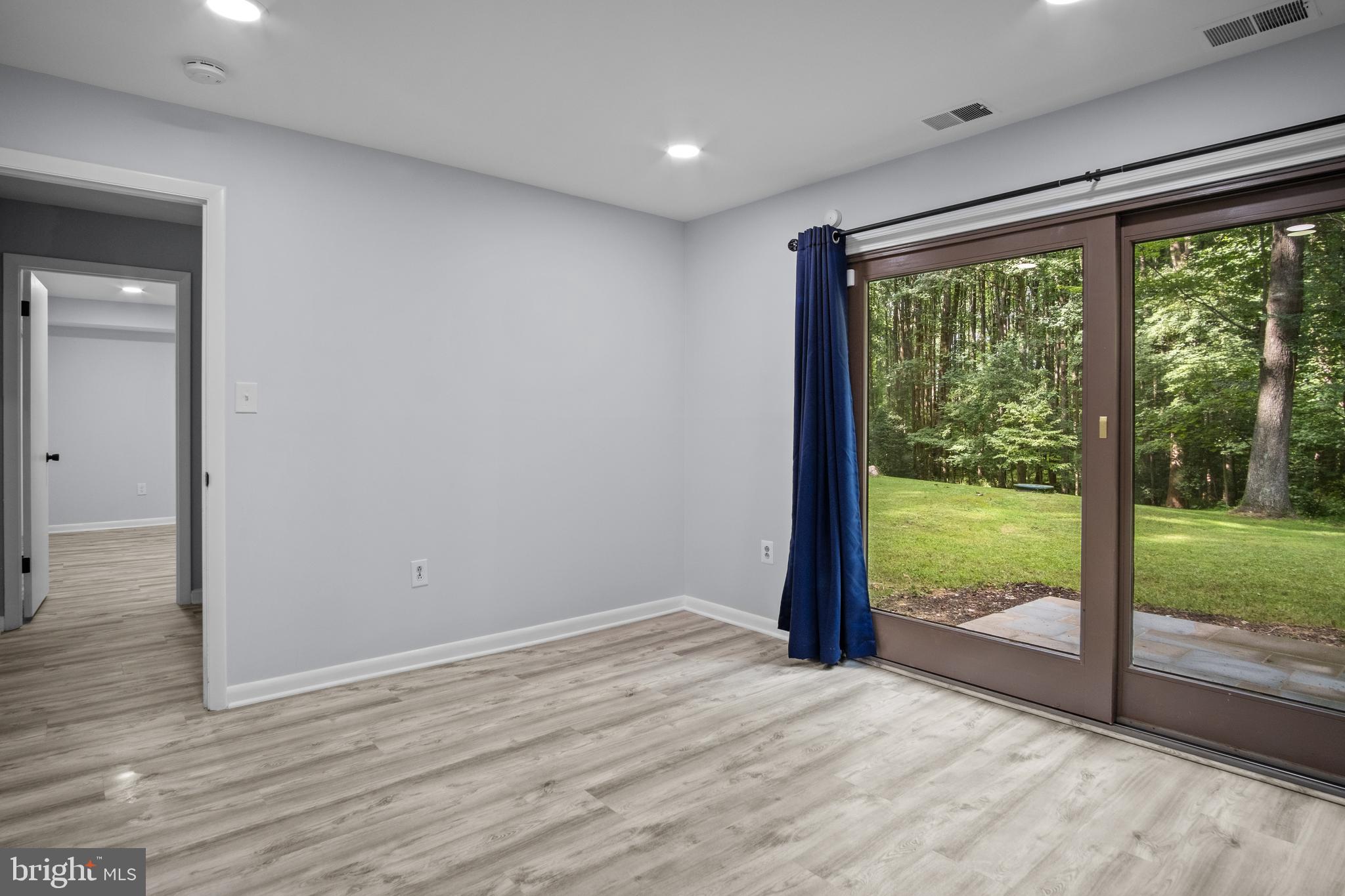 634 Springvale Road Great Falls, VA 22066 - Photo 57 of 67 a view of an empty room and wooden floor