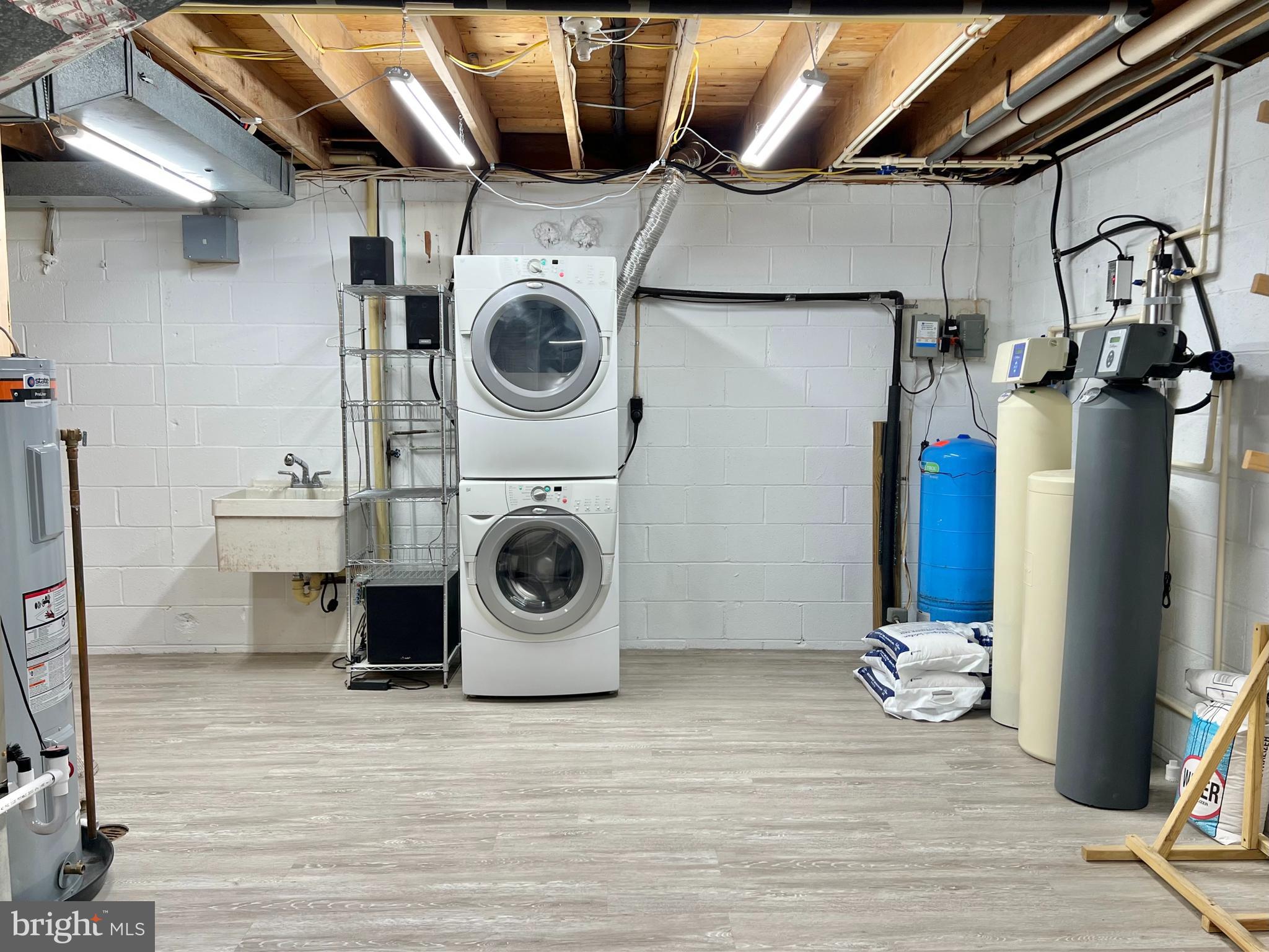 634 Springvale Road Great Falls, VA 22066 - Photo 66 of 67 a utility room with dryer and washer