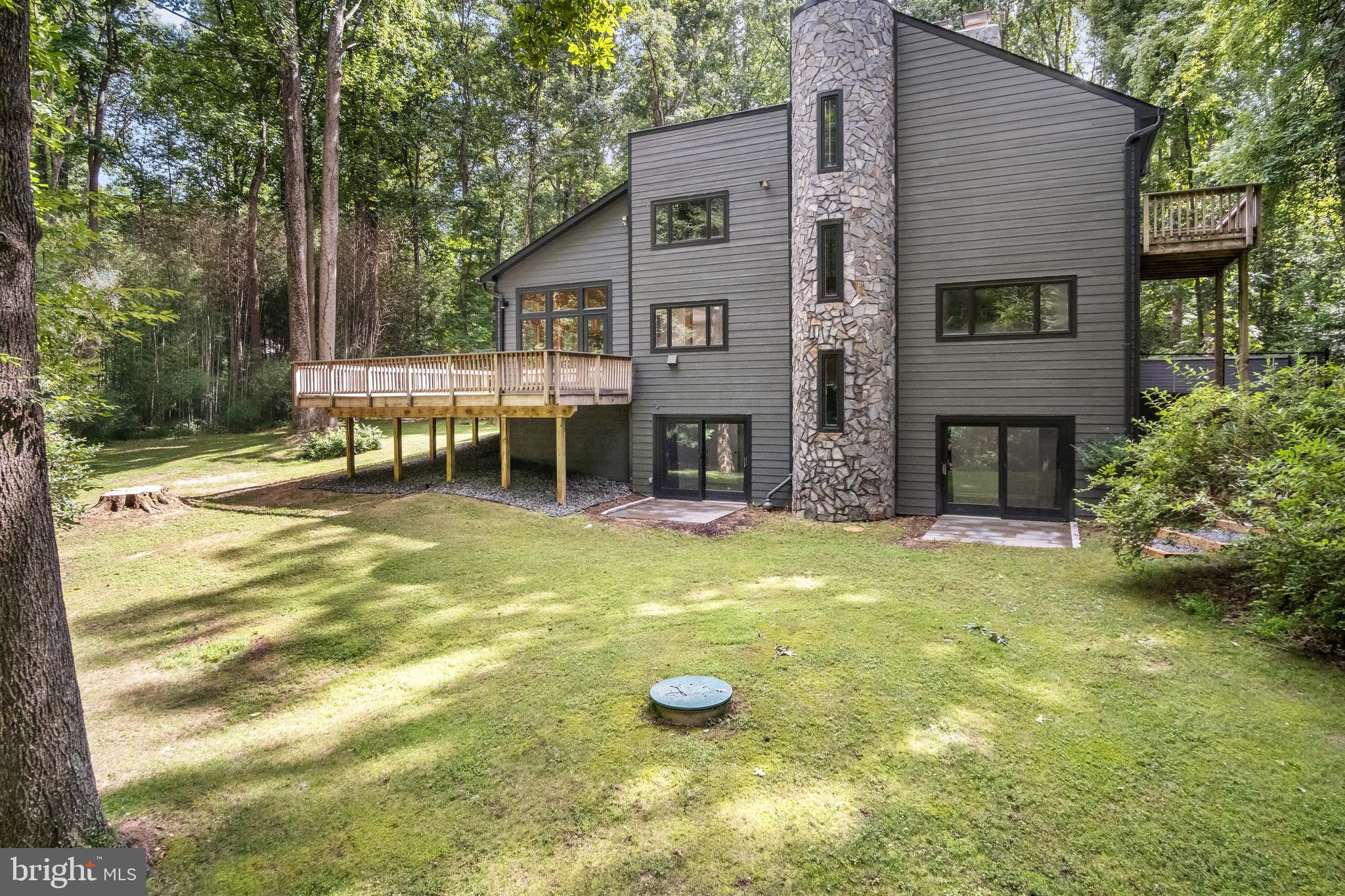 634 Springvale Road Great Falls, VA 22066 - Photo 10 of 67 a view of a house with a swimming pool