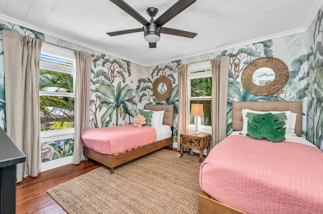 a bedroom with a bed and a table