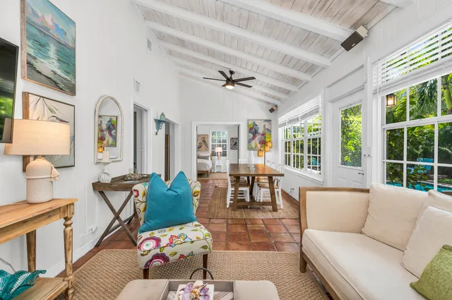 a kitchen with a refrigerator and a sink