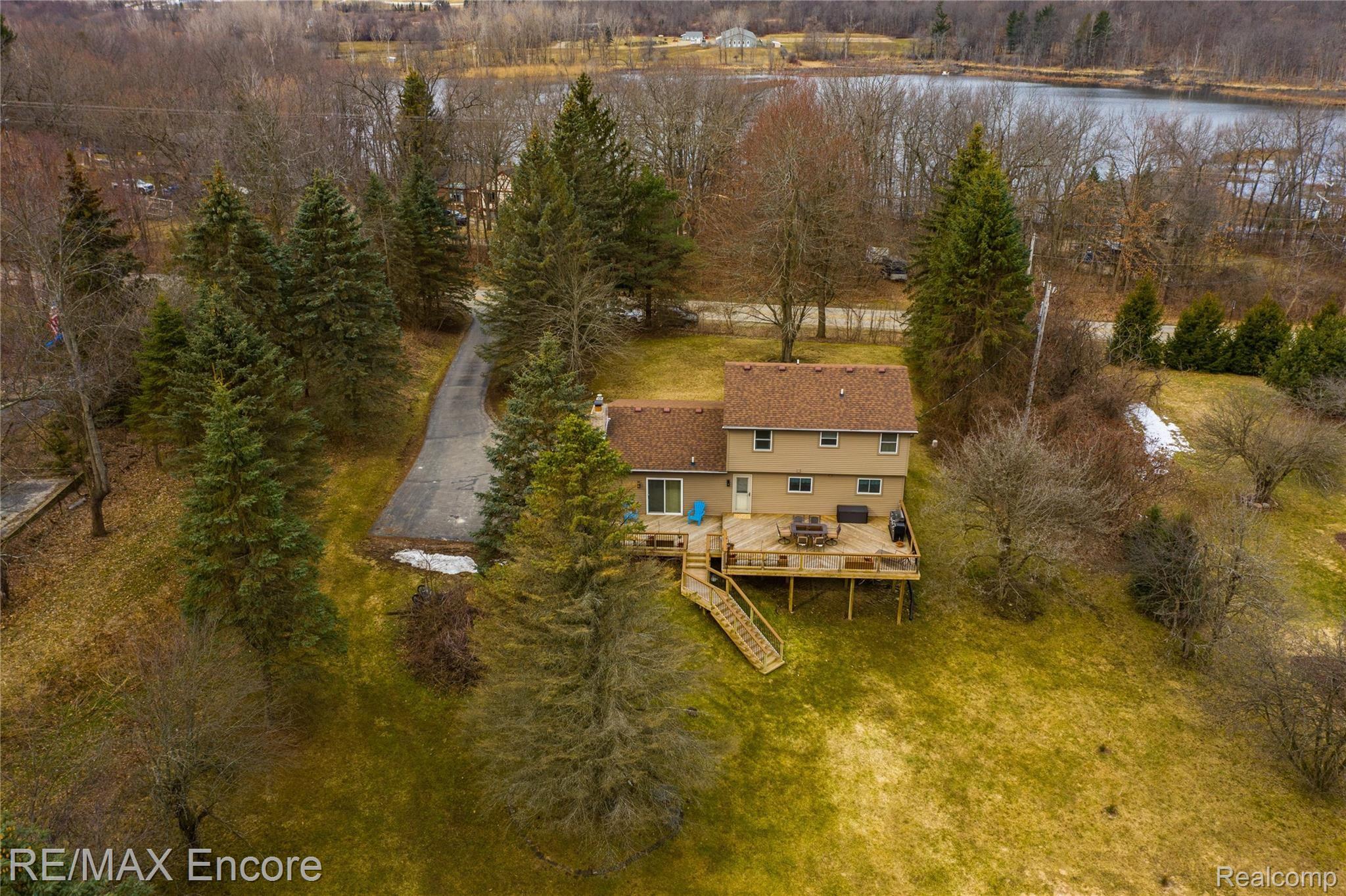 5835 Ludwig Road Oxford, MI 48371 - Photo 2 of 29 Enjoy Wildlife From Brand New Deck
