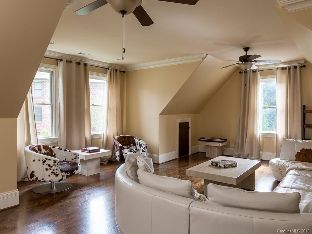 7099 Anchorage Lane Tega Cay, SC 29708 - Photo 13 of 24 a living room with furniture and a large window