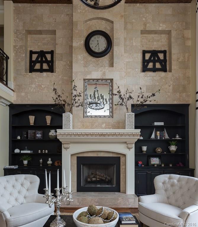 7099 Anchorage Lane Tega Cay, SC 29708 - Photo 3 of 24 a living room with furniture and a fireplace