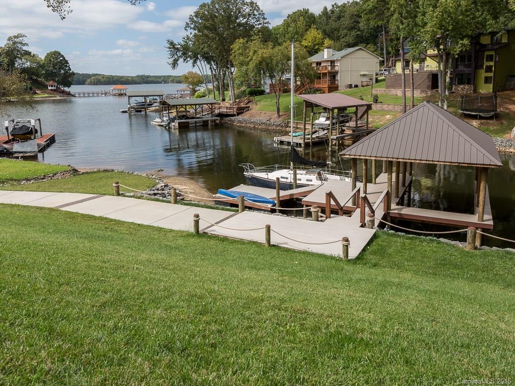 7099 Anchorage Lane Tega Cay, SC 29708 - Photo 23 of 24 a view of a house with swimming pool and sitting area