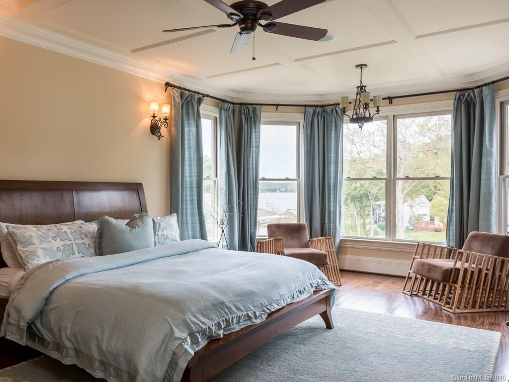 7099 Anchorage Lane Tega Cay, SC 29708 - Photo 9 of 24 a bedroom with a bed and a couch