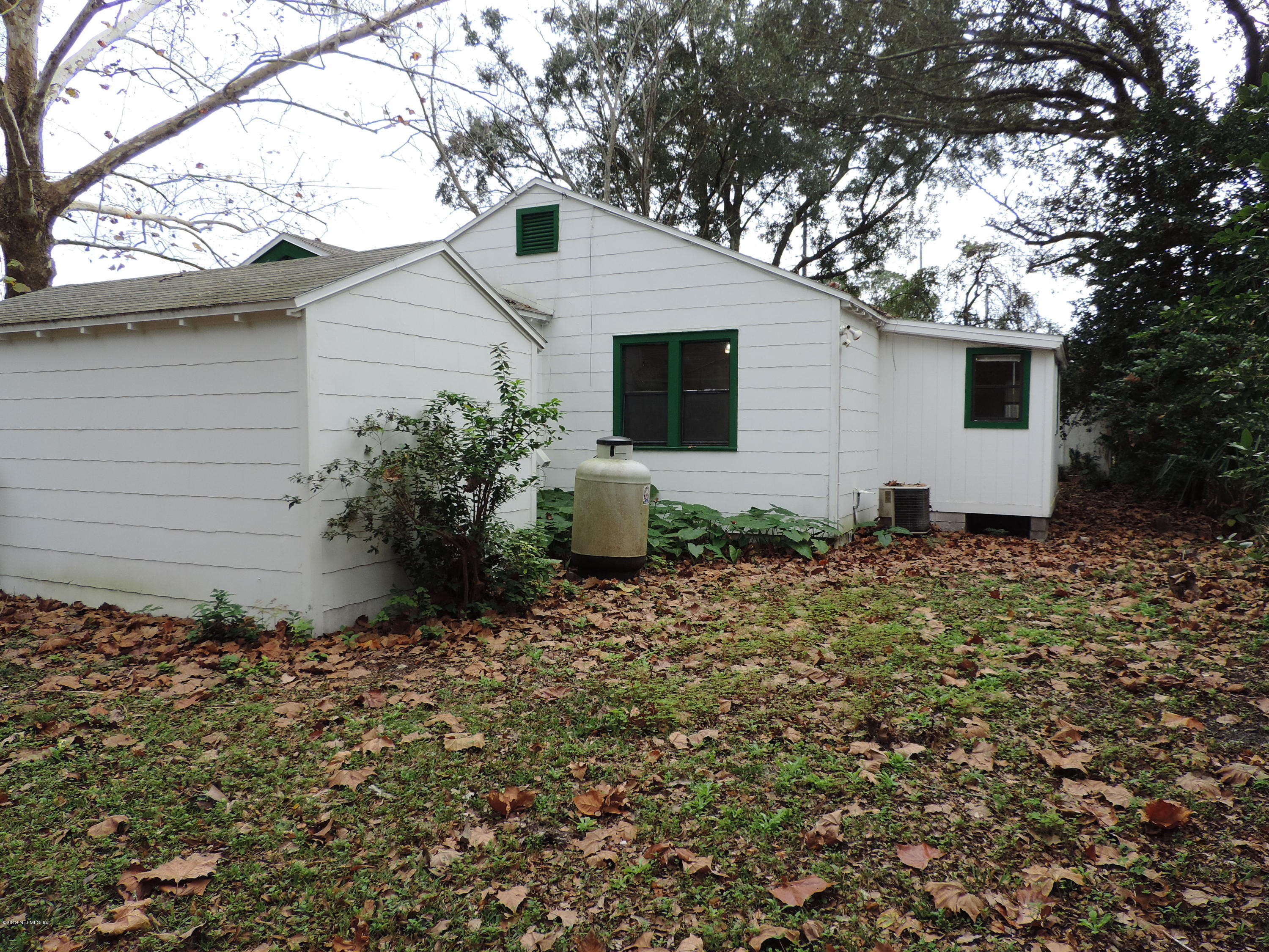 4244 Muncy Road Jacksonville, FL 32207 - Photo 18 of 19 a view of a house with a garden