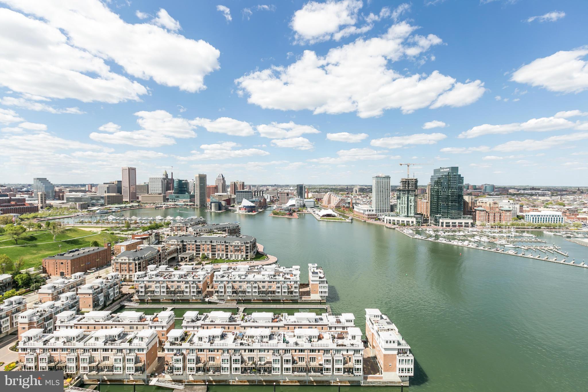 639 Ponte Villas South, Unit 128 Baltimore, MD 21230 - Photo 2 of 46 a view of a lake with a city