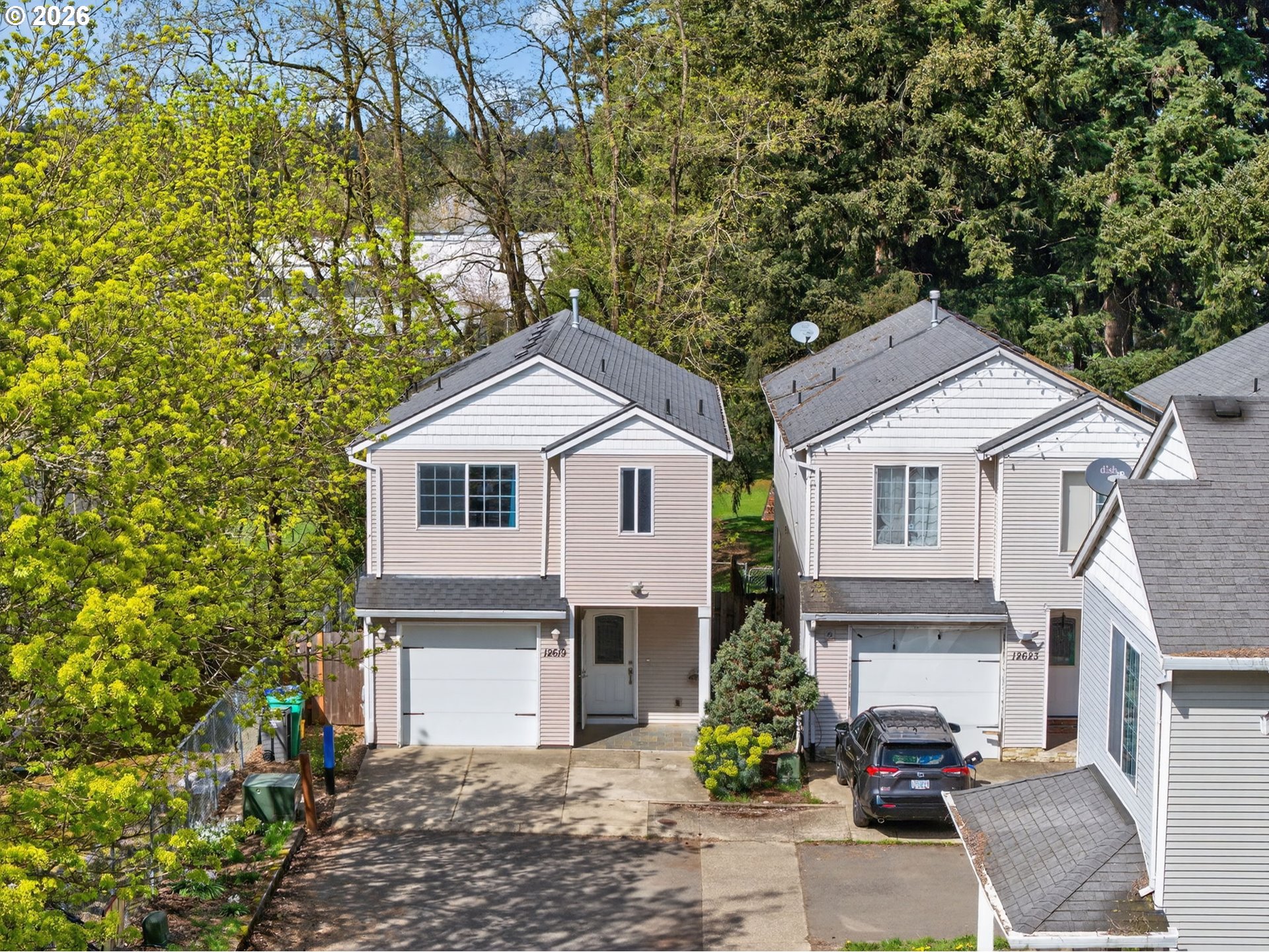 12619 Southeast Foster Road Portland, OR 97236 - Photo 1 of 48 a front view of a house with a yard