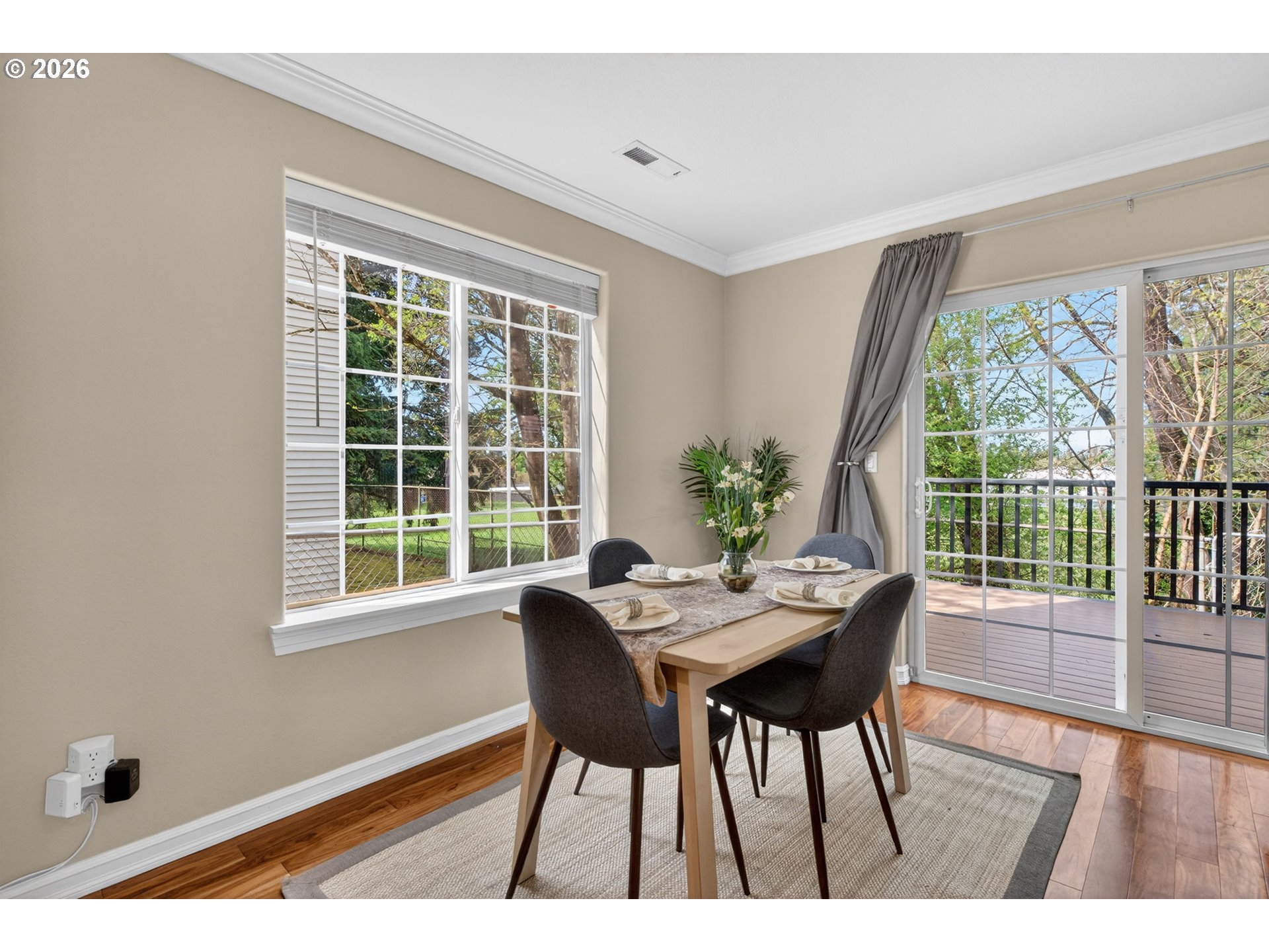 12619 Southeast Foster Road Portland, OR 97236 - Photo 14 of 48 a dining room with furniture window and wooden floor