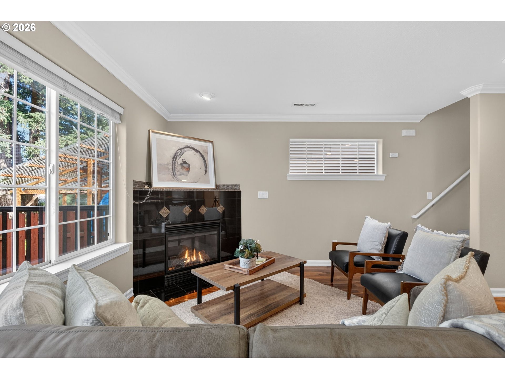 12619 Southeast Foster Road Portland, OR 97236 - Photo 16 of 48 a living room with furniture and a fireplace