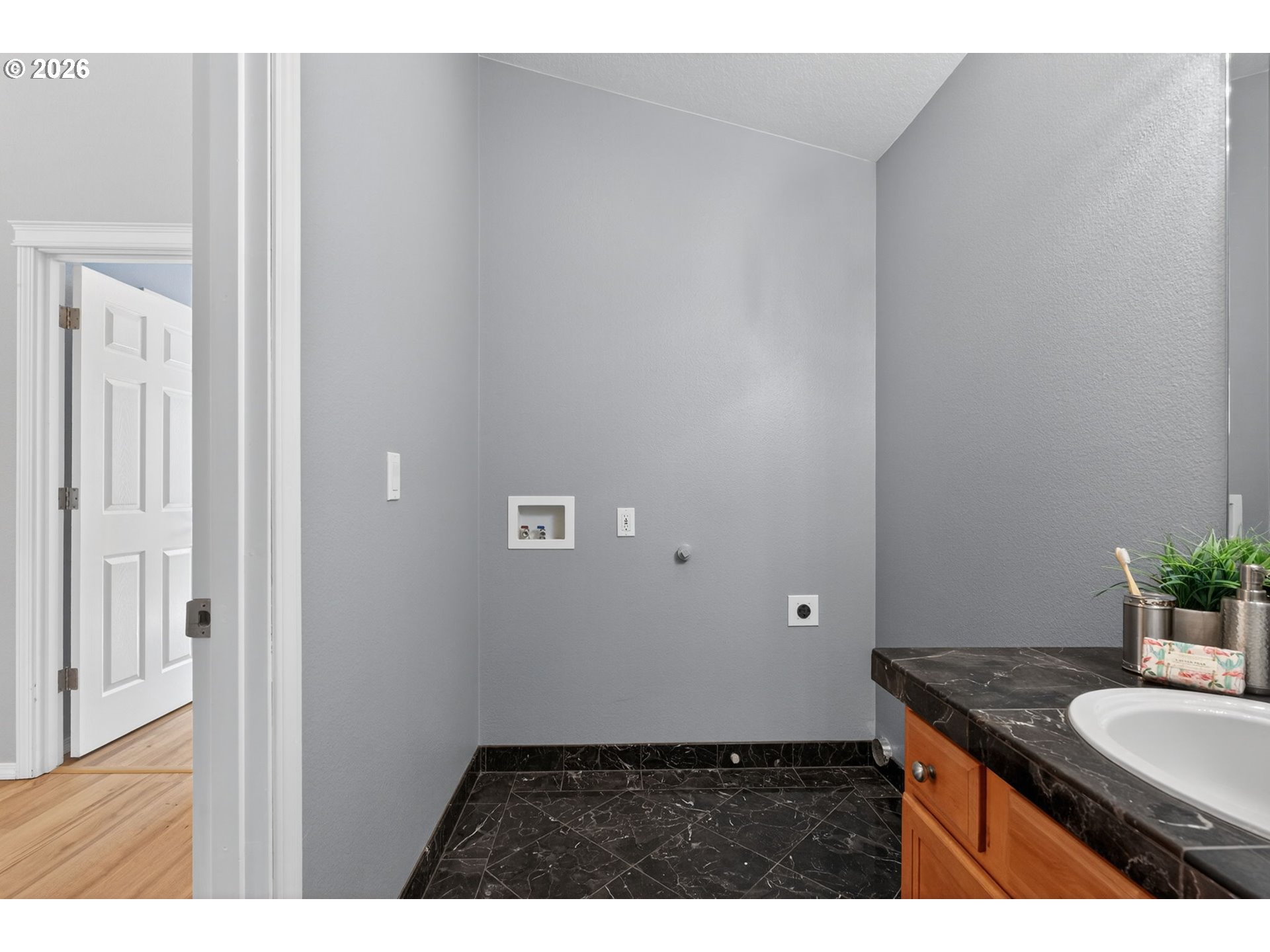 12619 Southeast Foster Road Portland, OR 97236 - Photo 33 of 48 a bathroom with a granite countertop sink and a mirror