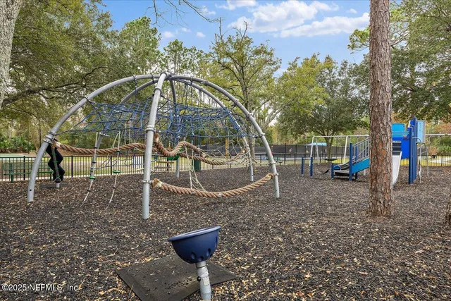 a backyard of a house with portable swimming pool and outdoor seating