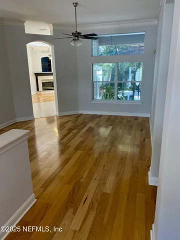 a view of a living room with a fireplace