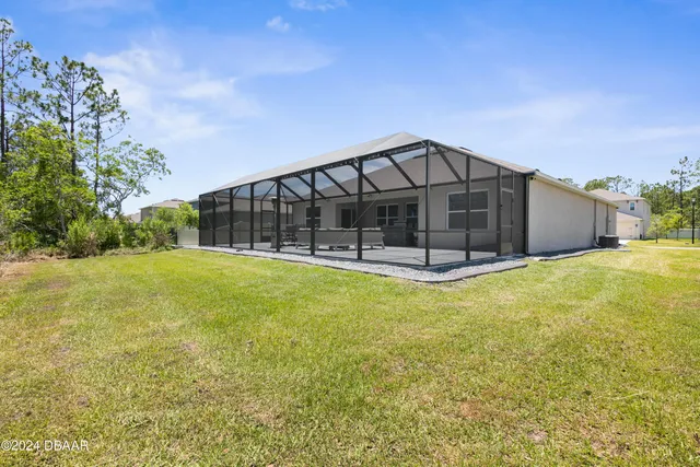 a view of a house with a swimming pool