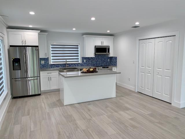 9 Center Lane Key Largo, FL 33037 - Photo 15 of 36 kitchen and dining area angle 1