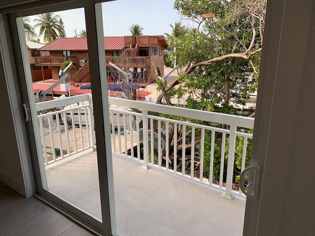9 Center Lane Key Largo, FL 33037 - Photo 32 of 36 Master Balcony angle 3