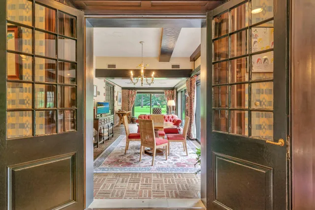 a view of a living room with a large window