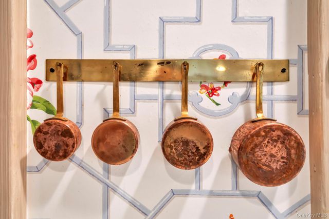 a utility room with lots of appliances and cabinets