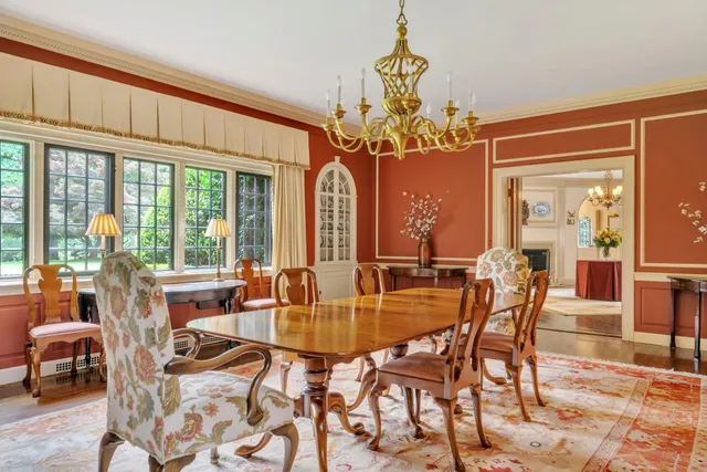 a view of hall way with furniture