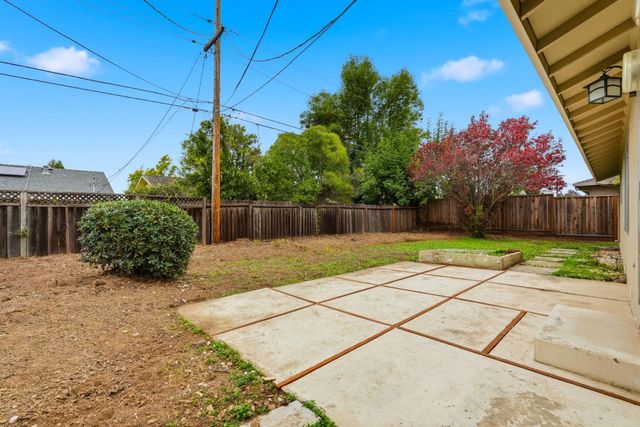 a view of a backyard with a garden