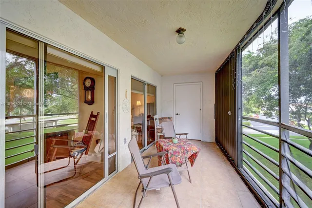 a room with patio furniture