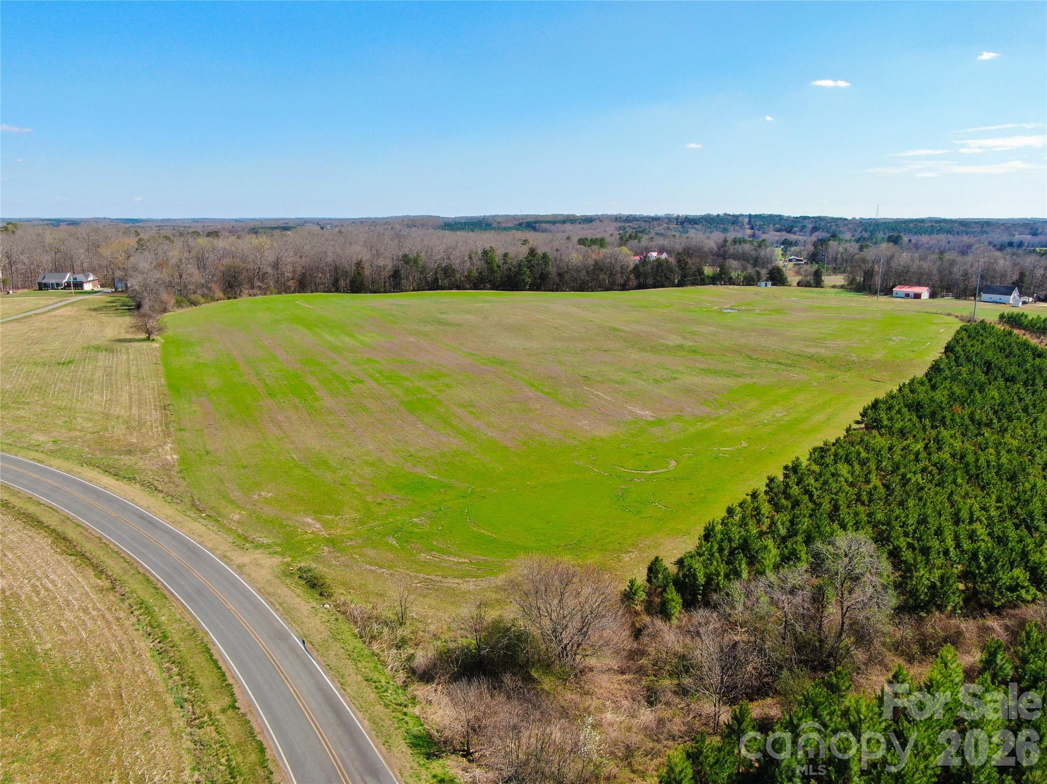 5001 Paige Road Mount Pleasant, NC 28124 - Photo 2 of 7 a view of a lake with a big yard