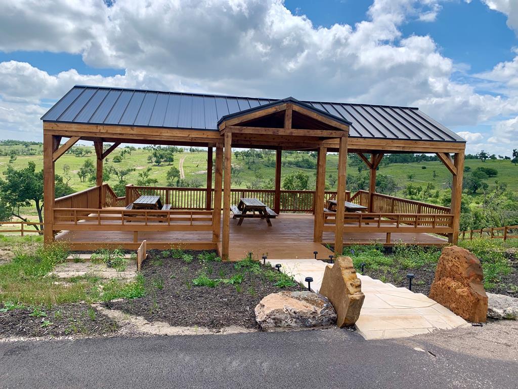 517 Dancing Sun Road Fredericksburg, TX 78624 - Photo 35 of 37 a patio with table and chairs