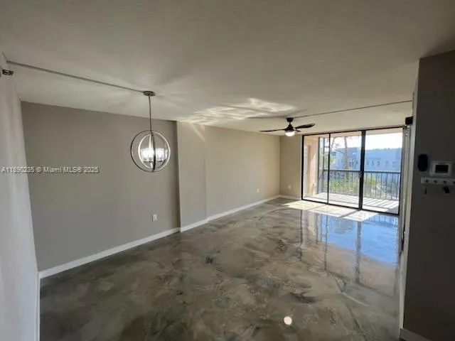 a bedroom with a bed and a large mirror