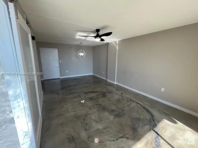 a view of a balcony with wooden floor and staircase